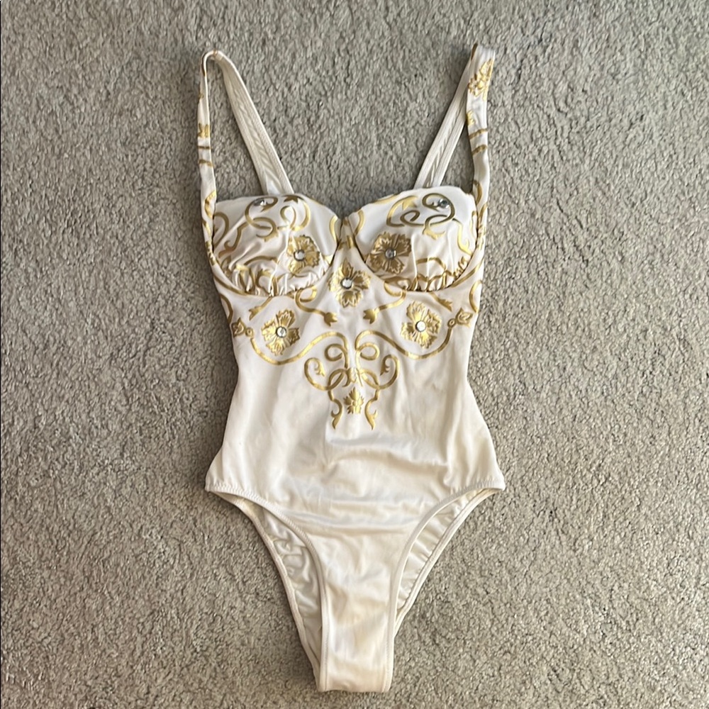 Vintage Women’s Cream one piece with gold embellishments and silver rhinestones.